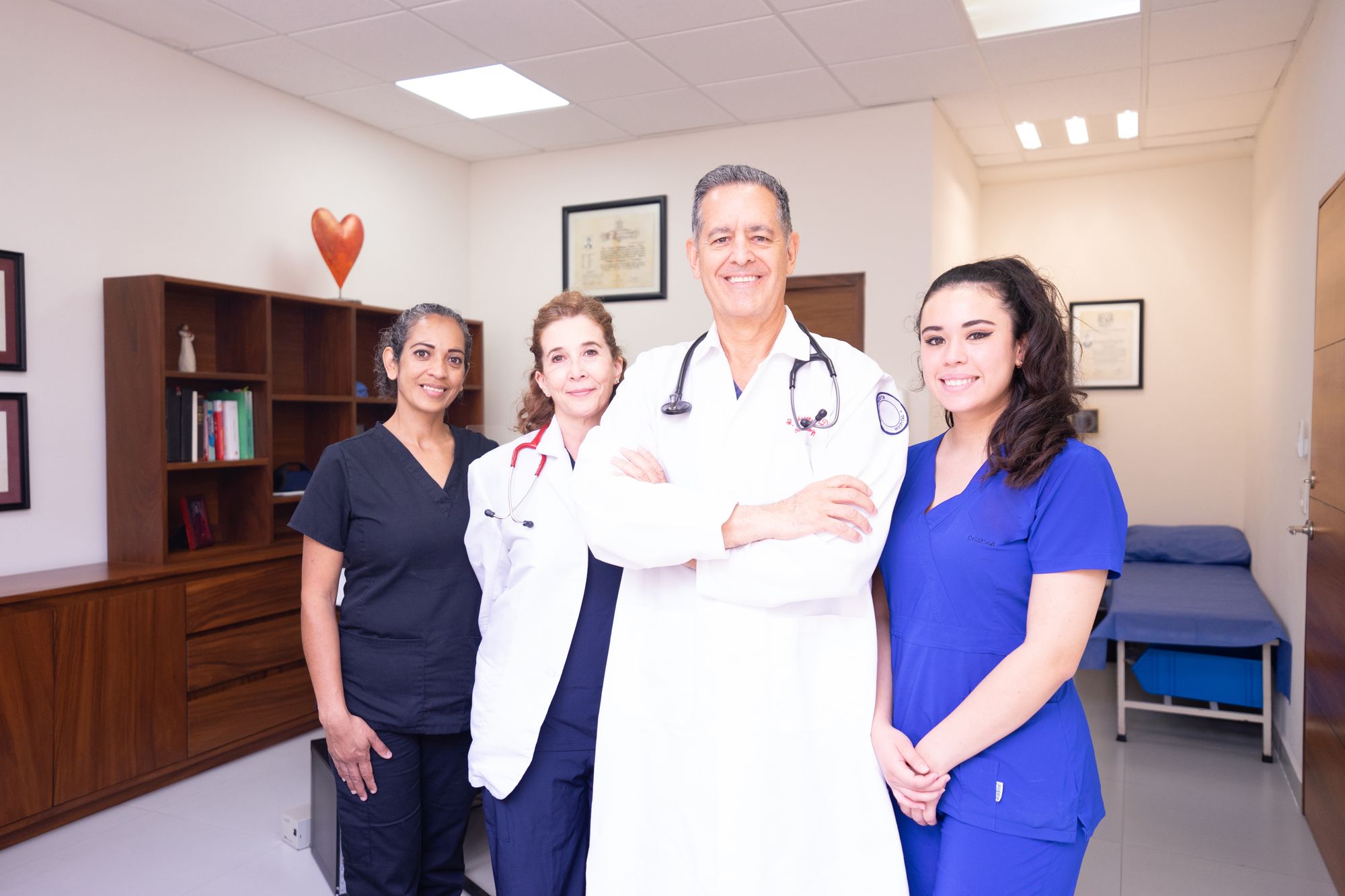 A PowerCare team of nurses and clinicians smiling together